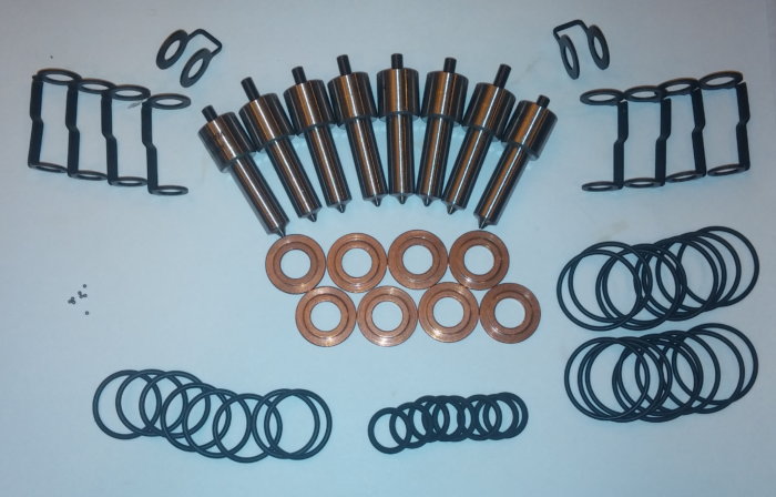 Full Duramax LB7 injector kit parts laid out